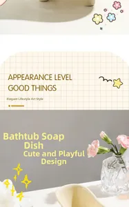 Detail of a beige ceramic bathtub soap dish with integrated drainage on a bathroom counter