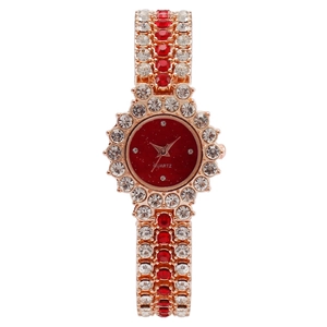Luxuriöse Damenuhr in Roségold mit roten Kristallen und strassbesetztem Armband