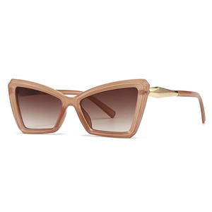 Modern cat-eye sunglasses with nude frames and gradient brown lenses on white background