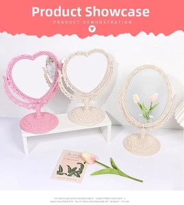 European vintage vanity mirrors with heart and oval shapes on stable round bases