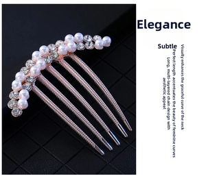 Close-up of rose gold five-tooth hair comb with elegant pearls and crystal rhinestones