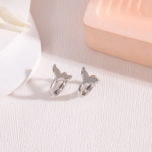 Silver mermaid tail hoop earrings for women with minimalist ocean-themed design