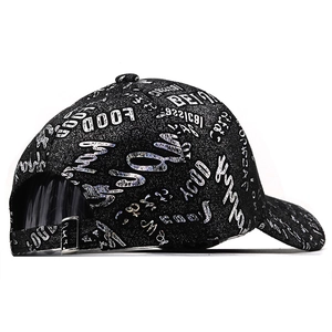 Black hard-top baseball cap with silver graffiti print and metallic adjustable buckle