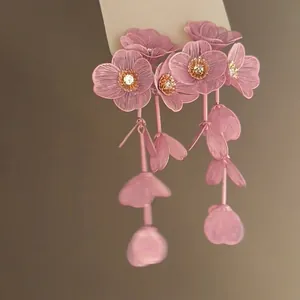 Pink floral drop earrings with metallic mesh petals and crystal center for a sweet look