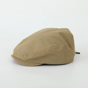 Detailed side view of khaki kids beret hat showing premium fabric texture and brand label