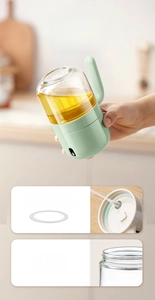 Detail view showing the leak-proof silicone sealing ring and threaded mouth of the glass oil bottle.