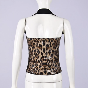 Detail of leopard print sequin crop top back with racerback cut on white mannequin