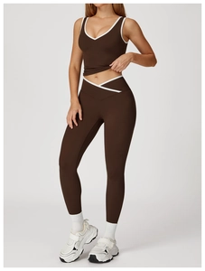 Detail of cross high-waisted yoga set with contrast trim and backless sports bra design