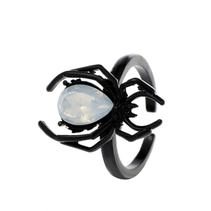Vintage black spider open ring with blue waterdrop opal stone in a top-down view