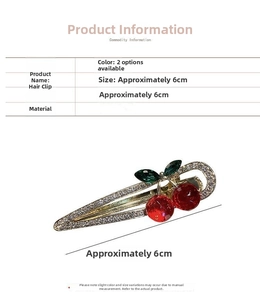 Macro view of 6cm cherry hair clip with red crystal beads and silver duckbill base