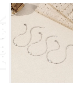 Detailed view of three elegant S925 sterling silver bracelets with moissanite pendants