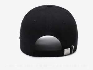 Detail view of black cotton baseball cap with adjustable silver metal buckle on back