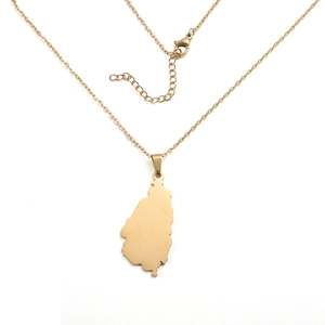Detail of gold Germany map pendant necklace with lobster clasp on a thin chain