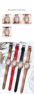 Detail of GEDI oval women's watch with crystal bezel and four color leather straps