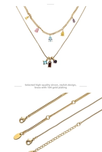 Detail of 18K gold plated brass clasp and extension chain on colorful zircon necklace