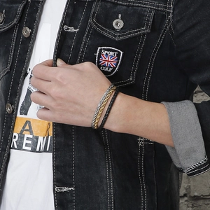 Three-layer men's bracelet set with gold twist chain, silver curb chain and black leather