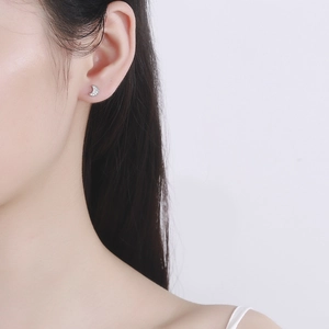 Minimalist 925 sterling silver crescent moon screw back earrings with sparkling zirconia
