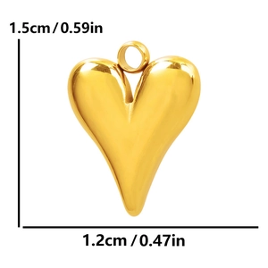 Close-up of golden stainless steel heart pendant with dimensions 1.5cm by 1.2cm