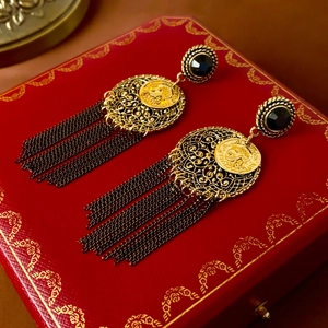 Bohemian gold tassel earrings with black gemstone and coin relief in vintage box