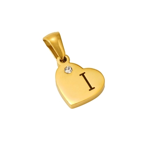 Detail of a golden heart pendant featuring a small diamond and the engraved letter I