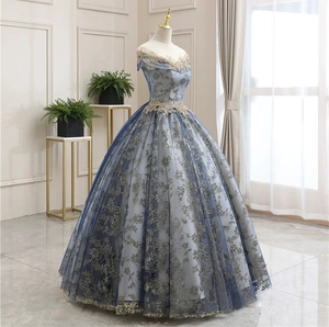Exquisite floral embroidery on an off-shoulder light blue tulle floor-length ball gown