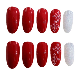 Christmas red and white press-on nails with snowflake patterns and glitter almond shape