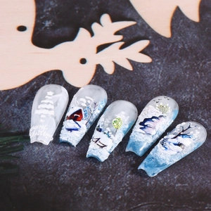5D embossed Christmas nail stickers featuring Santa, snowflakes, and penguins in winter theme