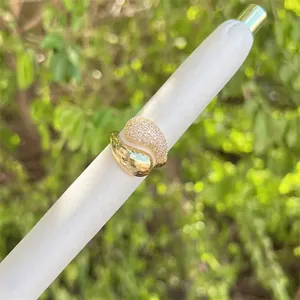 18K gold plated brass open ring featuring a teardrop design with pavé set cubic zirconia