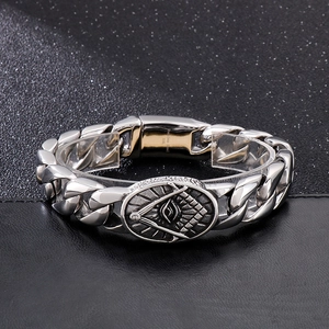 Macro shot of 316L stainless steel Cuban chain link bracelet with Freemason emblem