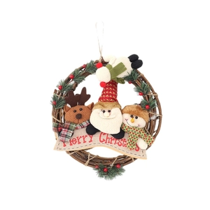 Christmas wreath with Santa, Reindeer and Snowman dolls on rustic woven vine rattan
