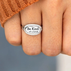 Minimalist s925 silver letter ring with oval face and diamond bezel on a hand
