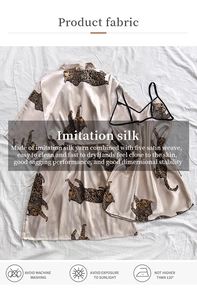 Detail of champagne leopard print faux silk robe and V-neck slip nightgown set