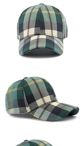 Detail of multi-color plaid baseball cap showing fabric texture and six-panel structure