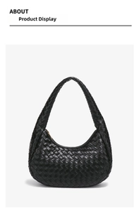 Detail shot of the black woven leather hobo bag showing the intricate handmade texture