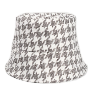 Detailed view of the houndstooth pattern and thick fabric on a classic bucket hat