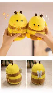 Detail shots of plush bee duck keychain showing wings and embroidered dollar sign charm