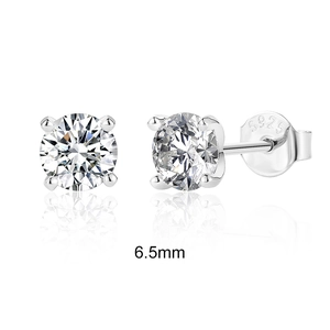 Macro shot of 2 carat round-cut moissanite earrings with 4-prong S925 silver setting