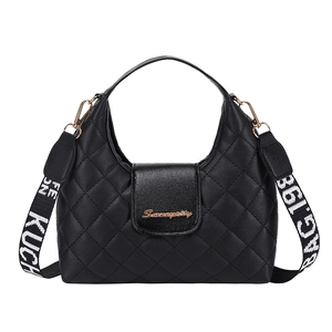 Fashionable black quilted PU leather handbag with wide shoulder strap and gold hardware