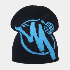 Close-up of winter jacquard beanie featuring black knit and light blue abstract pattern