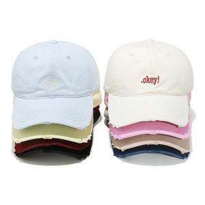 Vintage style baseball cap with okey embroidery in multiple pastel colors and distressed brim