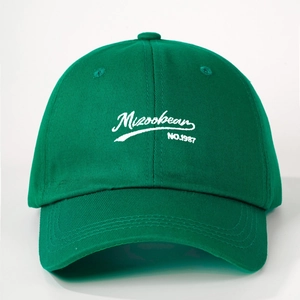 Classic dark green cotton baseball cap featuring white Mizookean 1987 embroidery