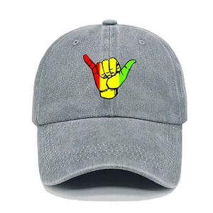 Detailed front view of grey washed denim baseball cap with colorful Shaka gesture print