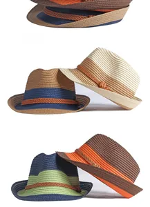 Detail of color-blocked straw fedoras showing woven texture and decorative bands