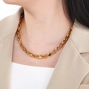 Elegant gold geometric link chain necklace for men and women on a professional model