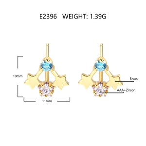 Detailed view of star-shaped 18k gold earrings with colorful AAA+ zircon stones