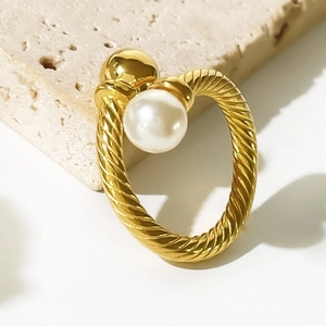Chic 18K gold plated titanium steel ring featuring an elegant cross design with white pearls