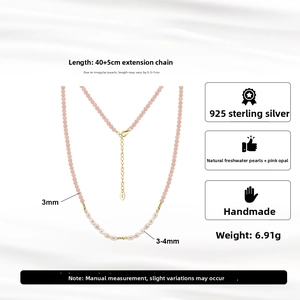 Detail of S925 sterling silver lobster clasp and extension chain on pink opal necklace