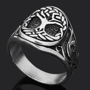 Macro shot of Viking Tree of Life ring with vintage silver finish and intricate engravings