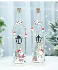 Close-up of LED glowing Christmas wish bottles with Santa and Snowman miniatures
