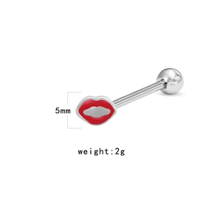 Detail view of 5mm red lip piercing jewelry showing the silver barbell bar and 2g weight